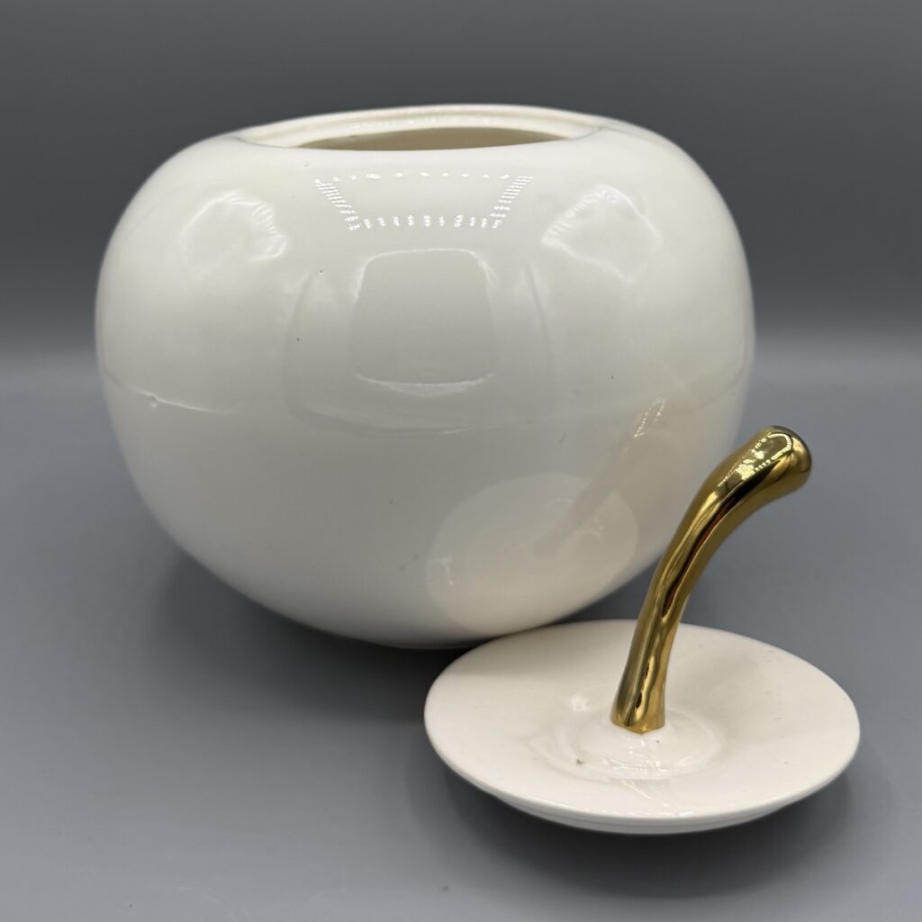 mela in ceramica apribile.