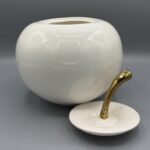 mela in ceramica apribile.